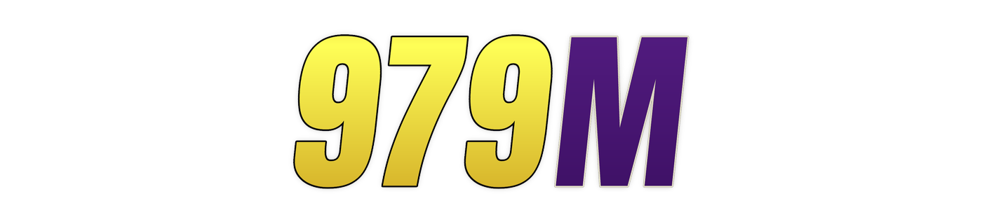 979m